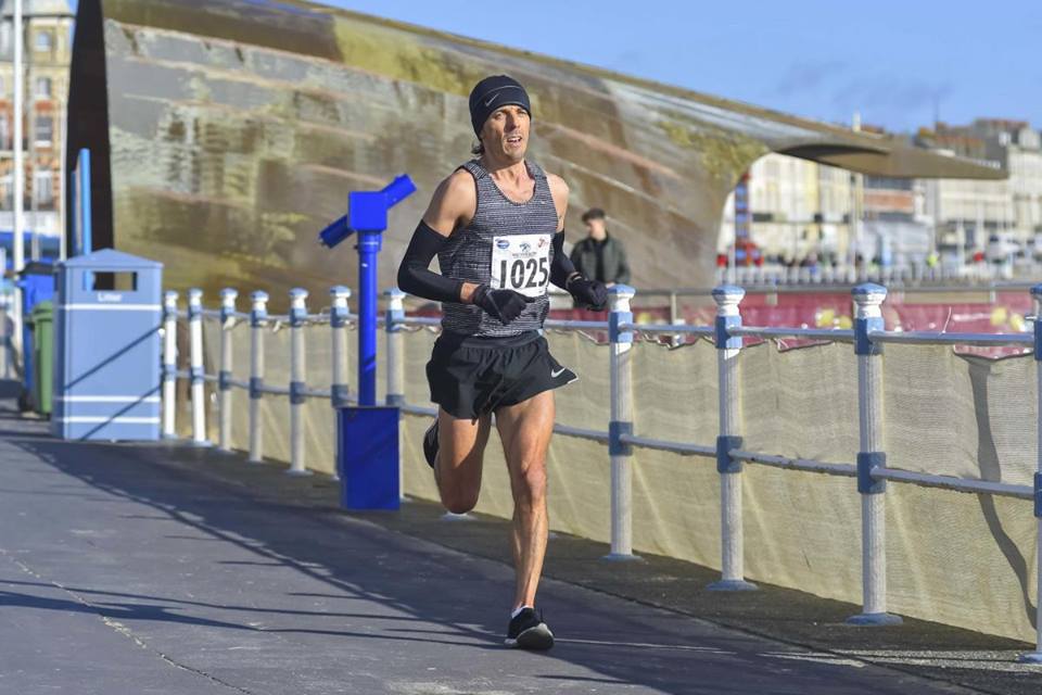 Jacek Cieluszecki surges on in the Weymouth Half Marathon