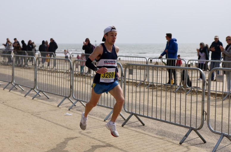 Rob McTaggart crusing along the promenade in the Bournemouth Bay Run Half Marathon