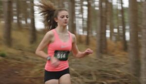 Neve East heads through the woods in the Winter Woodland Run 4k
