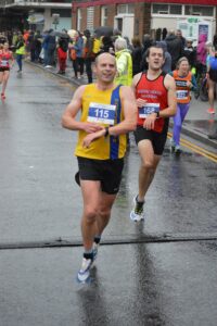 Alex Goulding finishing the Junction Broadstone Quarter Marathon