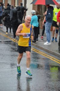 Ian Graham finishing the Junction Broadstone Quarter Marathon