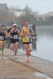 Ollie James racing well in the Round the Lakes 10k