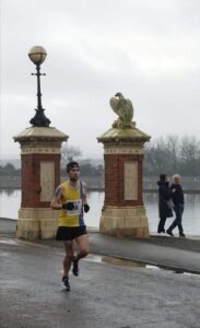 Trev races past in the Round the Lakes 10k