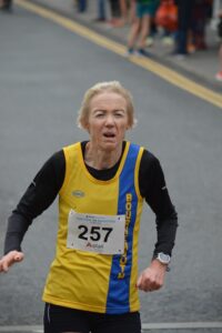 Debbie Lennon completing the Junction Broadstone Quarter Marathon