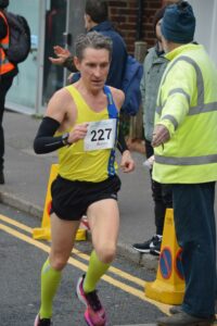 Sam Jackson completing the Junction Broadstone Quarter Marathon