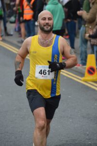 Wayne Walford Jelks completing the Junction Broadstone Quarter Marathon