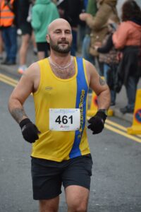 Wayne Walford Jelks gets over the line in the Junction Broadstone Quarter Marathon