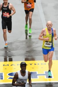 Barry goes over the line in the Boston Marathon