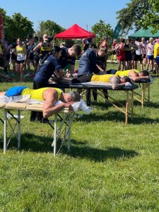 The BAC men getting massages after the Netley 10k