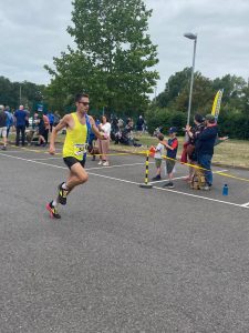 Stu Nicholas heads to the finish in the Lordshill 10k