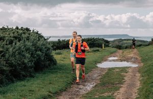 Tom and Bobby in action in the Maverick Jurassic Coast 56km Ultra