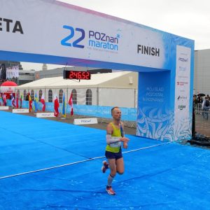 Szymon crosses the finish line in the Poznan Marathon