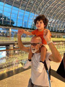 Sanjai Sharma with his grandson in Singapore