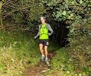 Stu Nicholas heading through the woods in the Dark Valley Half Marathon