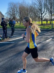 Emma Caplan runs past in the Stubbington 10k