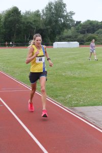 Emma Caplan approaching the line
