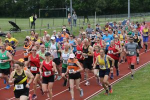 Jud Kirk with Julia Austin and Louise Price in the background