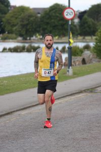 Adam Corbin heading past the lake