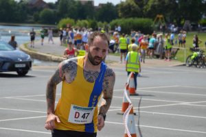 Adam Corbin in the Poole Festival of Running Relays