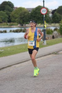 Jason Christian heading past the lake