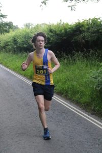 Nathan Mearns finishing the Purbeck 10k