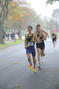 Jame Grose leading Poole AC train at the front of the field