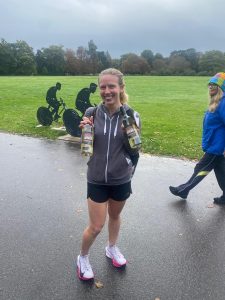 Katie Gunn with the bottles of wine she won at the Round the Lakes 10k