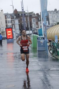 Chris Peck winning the Weymouth 10