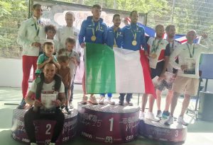 Szymon Chojnacki with his Poland team on the podium of the European Masters Championships 10k