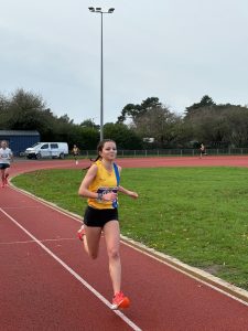 Amelia Lawrence finishing the Boscombe 10k