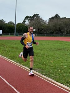 Luke De-Benedictis finishing the Boscombe 10k