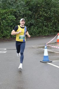 Tom Ralph finishing the Lytchett 10