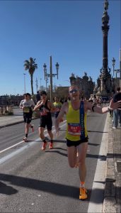 Barry Dolman giving a high five in the Barcelona Marathon