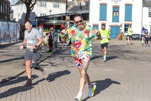 A man with a funky shirt in the Weymouth Half Marathon