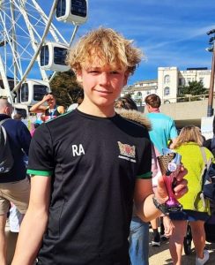 Riley Austin with his trophy for third place in the Bournemouth Bay 10k