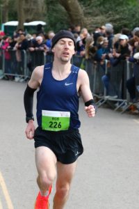 Rob McTaggart giving his all in the Fleet Half Marathon