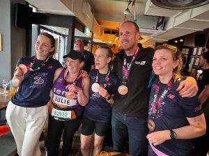 Clint Taylor with friends and family after the London Marathon