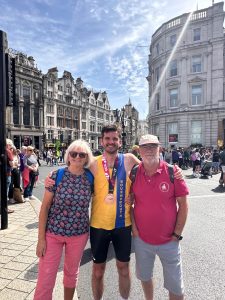 James Hulbert with his parents after London Marathon