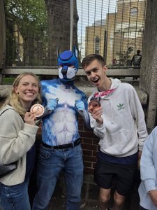 Katie Gunn and Jack Barwick with some sort of super hero