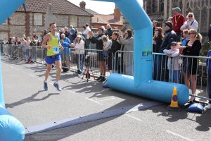Stu Nicholas coming in to win the Norfolk Marathon