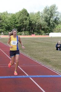 Emma Caplan finishing third female