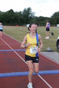 Helen Beddoe finishing the May 5