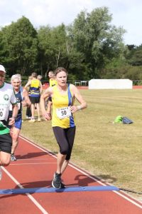 Julia Austin finishing the May 5
