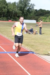 Luke De-Benedictis finishing the May 5