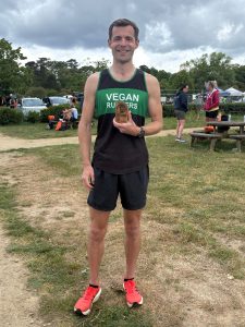 Matt Du Cros with his trophy for finishing fourth in the Netley 10k