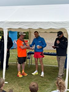 Trev Elkins collecting his trophy for first vet