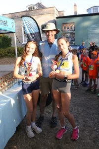 Florence Robbins and Poppy Fulling pick up their trophies for top two in the Girl 13 category