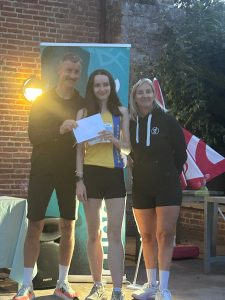 Kitty Cook picks up her prize for winning the female 18-39 category