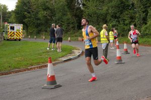 James Hulbert comes round the corner in the Overton 5