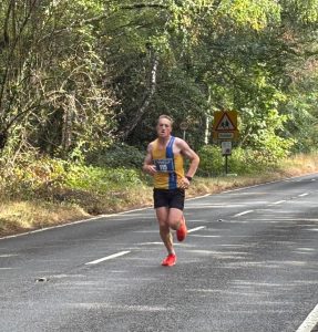 Josh Cole heading up the road in the Overton 5